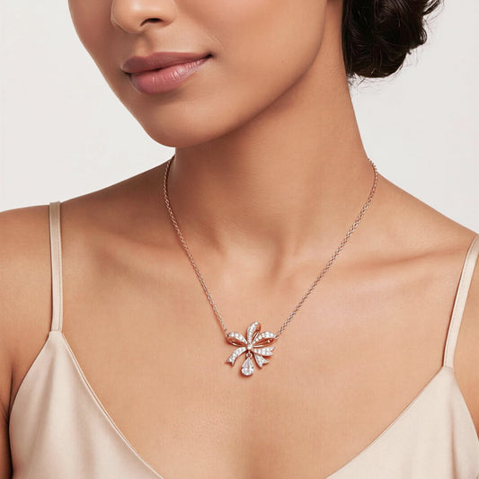 AMAZING VOLTA NECKLACE BOW IN ROSE GOLD TONE😍*